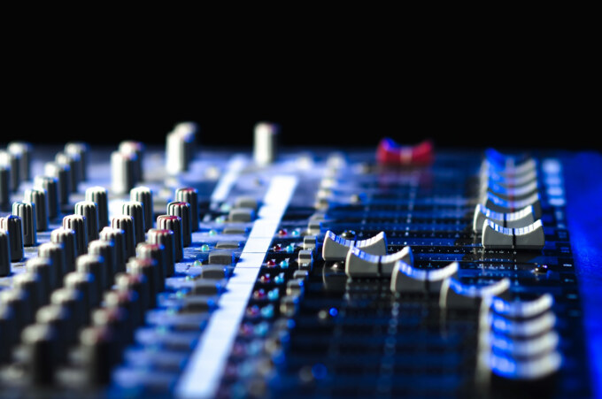 Mixing,Console,On,A,Black,Background,,Musical,Instrument,For,Scoring