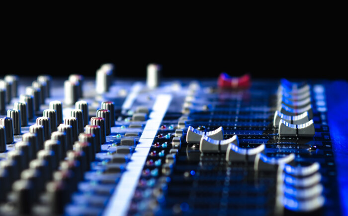 Mixing,Console,On,A,Black,Background,,Musical,Instrument,For,Scoring